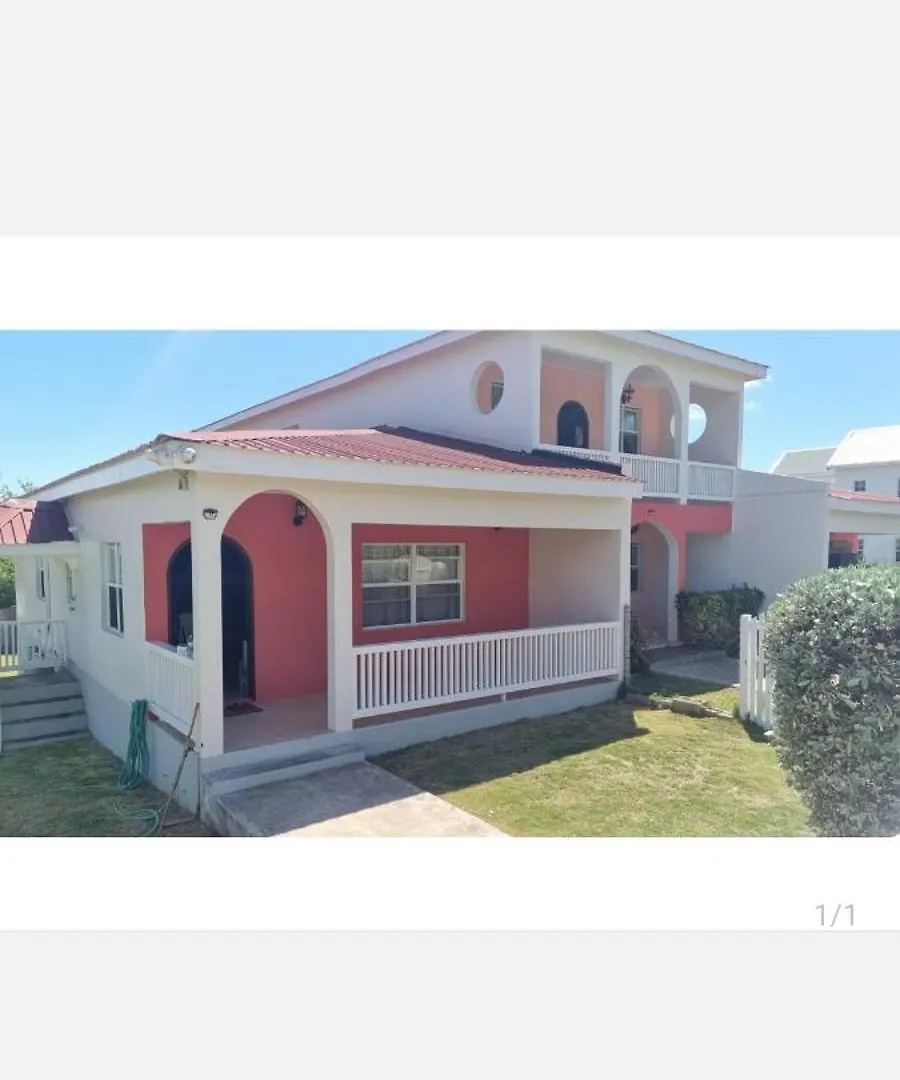 Apartamento Halfmoon Bay Pink Butterfly Frigate Bay